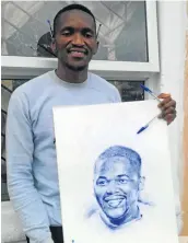  ?? Picture: TWITTER ?? UNPROTECTE­D ART: Themba Mkhangeli holds his portrait of late rapper ProKid.