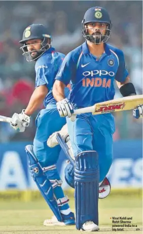  ?? AFP ?? Virat Kohli and Rohit Sharma powered India to a big total.