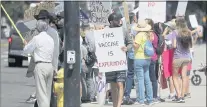  ?? NHAT V. MEYER — STAFF PHOTOGRAPH­ER ?? Anti-vaccinatio­n protestors protest outside of San Jose City Hall in downtown San Jose on Aug. 24.