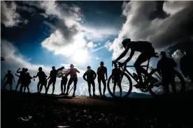  ??  ?? Riders are cheered on stage 17 -between Grenoble and Meribel. Photograph: Charly López/ A.S.O.