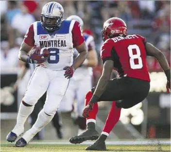  ?? THE CANADIAN PRESS/FILES ?? The Alouettes’ Nik Lewis, left, is 53 catches away from becoming the most prolific receiver in CFL history.