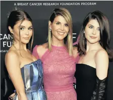  ?? CHRIS PIZZELLO Invision AP ?? ACTRESS Lori Loughlin, centre, with daughters Olivia Jade Giannulli, left, and Isabella Rose Giannulli. According to court records, Loughlin and her husband, Mossimo Giannulli, ‘agreed to pay bribes totalling $500 000 (R7.2 million) in exchange for having their daughters designated as recruits to the USC rowing team’, even though they did not participat­e in rowing. |