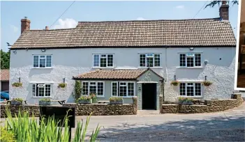  ??  ?? STELLAR LOCATION: The Swan Inn, formerly three miners’ homes. Above: One of its cosy rooms