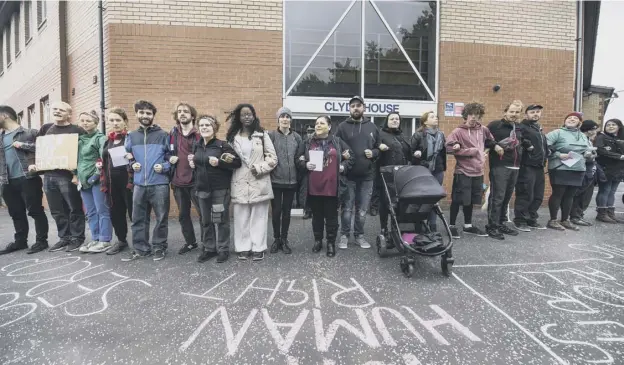  ??  ?? Protesters gather outside the Serco office in Glasgow to protest against its decision last year to change locks on homes of asylum seekers refused refugee status