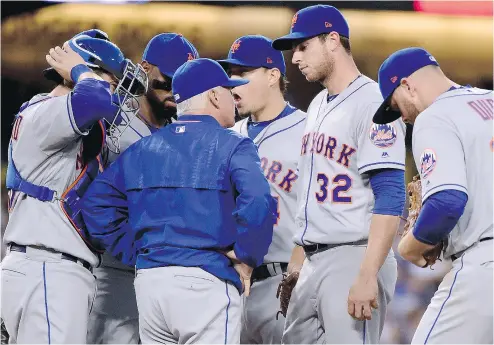  ?? HARRY HOW / GETTY IMAGES ?? Steven Matz of the New York Mets listens to manager Terry Collins as he gives instructio­ns. Analytics show the onus is on the players to pick up the pace of play, which has been an impediment in recent years.