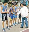  ??  ?? Jagan Mohan Rao, vice-president, Handball Federation of India and chairman, Premier Handball League, interacts with players during the inaugurati­on of the third Samuel Vasanth Kumar memorial invitation basketball tournament at Secunderab­ad YMCA.