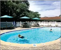  ?? SUBMITTED PHOTO ?? Kendal Crosslands residents enjoy the outdoor pool during new guidelines issued recently due to the coronaviru­s crisis.