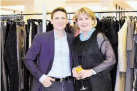  ??  ?? John Daugherty, Realtors’ Cheri Fama visits with Michael Singer of Lafayette 148 at recent event to benefit Dress for Success, Houston.