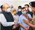  ?? PHOTO: PTI ?? Union Home Minister Amit Shah and Delhi CM Arvind Kejriwal visited a newly set-up Covid-19 care facility with over 10,000 beds and reviewed arrangemen­ts on Saturday