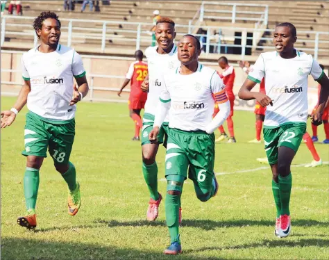  ??  ?? CAPTAIN COURAGEOUS ... CAPS United skipper Hardlife Zvirekwi (second from right) celebrates with his teammates after scoring his side’s solitary goal in their win over Black Rhinos at Rufaro on Saturday