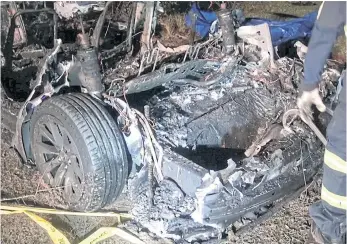  ?? SCOTT J. ENGLE VIA REUTERS ?? The remains of a Tesla vehicle are seen after it crashed in The Woodlands, Texas in this still image from video obtained via social media.