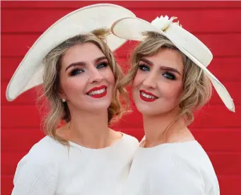  ??  ?? Helen Murphy (right) from Cree, Co Clare, was the winner of the Bollinger Best Dressed Lady competitio­n on day three at the Punchestow­n Festival in Co Kildare while Davinia (left, above) and Dawn Knight were a picture in white as they watched Faugheen...