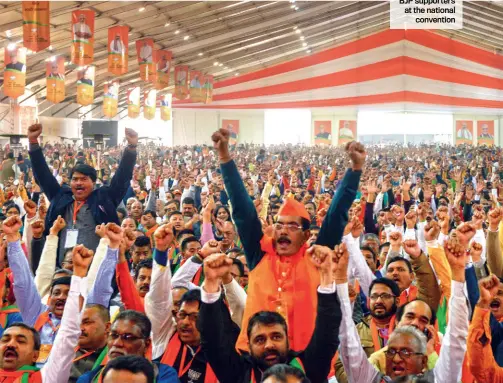  ??  ?? TEMPLE COLOURS BJP supporters at the national convention