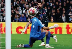  ?? Photograph: Matthew Childs/Action Images/Reuters ?? Bernardo Silva restores Manchester City’s lead by tucking the ball past Kamil Grabara.