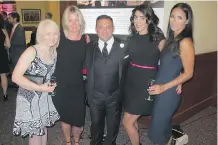  ??  ?? Co-chair of the second annual event, Tony Dilawri, partner, Dilawri Group of Companies, surrounded by lovelies, from left, Tina Giesbrecht, Ellen Dilawri (Tony’s wife), Sarine Mustapha and Lisa Atkins.
