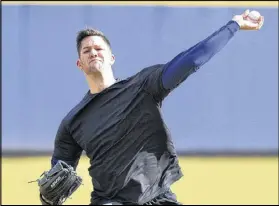 ?? KENT D. JOHNSON / KDJOHNSON@AJC.COM ?? The Braves’ Alex Wood, who missed his final start because of a forearm strain last season, was 11-11 with a 2.78 ERA in 35 games, including 24 starts, in 1712/3 innings in 2014.