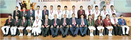  ??  ?? Recipients of Ceylinco Life ‘Pranama’ scholarshi­ps placed first in their districts at the GCE (Advanced Level) examinatio­n with Directors of the company