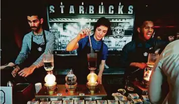  ?? AP ?? Starbucks says it expects wage growth to continue. Wages are one way large corporatio­ns can have an advantage over small businesses when it comes to hiring the best workers.