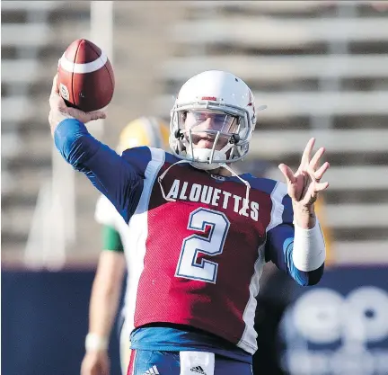  ?? ALLEN McINNIS ?? Alouettes quarterbac­k Johnny Manziel gets his first taste of CFL regular-season action Friday at Molson Stadium against the Ticats.