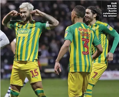  ??  ?? EAR WE GO: Charlie Austin celebrates his winner