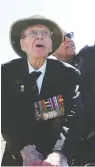  ?? JEAN LEVAC / POSTMEDIA NEWS ?? Andy Carswell and his son John Carswell attend a veterans ceremony in Ottawa in September 2019.