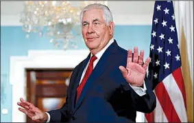  ?? AP/CAROLYN KASTER ?? Secretary of State Rex Tillerson leaves a meeting Friday with Libyan Prime Minister Fayez al-Sarraj at the State Department, where he called speculatio­n that he was being fired “laughable.”