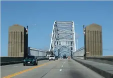  ?? NANcy lANE / HERAlD STAFF ?? HALF A BRIDGE: Traffic crosses the Sagamore Bridge last month. Traffic is down to one lane in each direction on the Cape bridge.