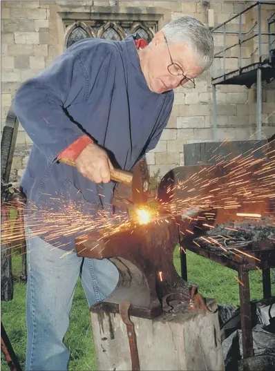  ?? PICTURE: JIM MORAN ?? METAL MAN: York-based blacksmith Don Barker at work.