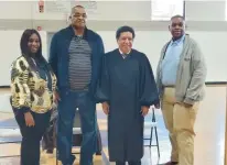  ?? RYAN BUCKLEY ?? Angelia Murphy-Watts, from left, Terry Lee, Judge Jesse G. Reyes and Ryan Buckley after a Feb. 2 swearing-in ceremony for the Robbins Park District Board members at the Robbins Community Center.