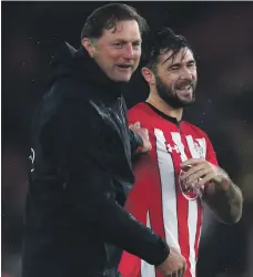  ?? Getty ?? Charlie Austin, right, has praised Ralph Hasenhuett­l for bringing changes to Southampto­n’s dressing room as new manager