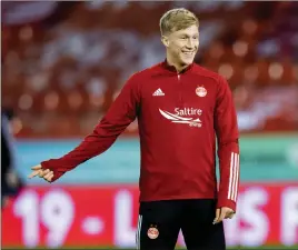  ??  ?? McCrorie’s fine form for the Dons was rewarded with a Scotland call- up