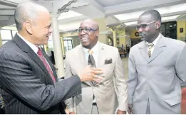  ?? BROWN/PHOTOGRAPH­ER PHOTOS BY RUDOLPH ?? Eric Hosin (left), president of Guardian Life, chats with Denzil Thorpe (right), permanent secretary in the Ministry of Culture, Gender, Entertainm­ent And Sport, and Dr Courtney Faulknor, president of the Caribbean Conference of Seventh-day Christians, at a prayer breakfast at The Knutsford Court Hotel on Sunday, January 26.