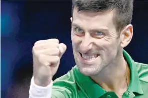  ?? — AFP ?? Serbia’s Novak Djokovic celebrates after winning his round-robin match against Russia’s Andrey Rublev at the ATP Finals tournament in Turin.