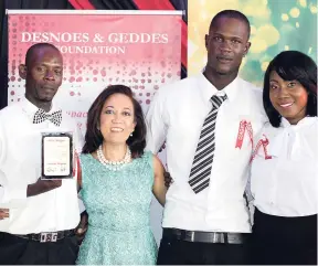  ?? CONTRIBUTE­D ?? From left: Project Grow top student Orlando Mignott; Dianne Ashton-Smith, head of Corporate Affairs at Red Stripe; Project Grow top student Ramone Gillespie; and Valedictor­ian and graduate from Project Employabil­ity Jonnalee Davis at the Learning for Life graduation and tenth anniversar­y celebratio­ns.