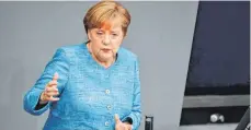  ?? FOTO: DPA ?? Bundeskanz­lerin Angela Merkel (CDU) will in China für das Atomabkomm­en mit Iran und mehr Offenheit im Handel werben.
