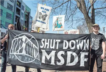  ?? BARBARA J. MINER ?? Protesters demand that the Milwaukee Secure Detention Facility be closed during a May Day rally in Waukesha earlier this year.