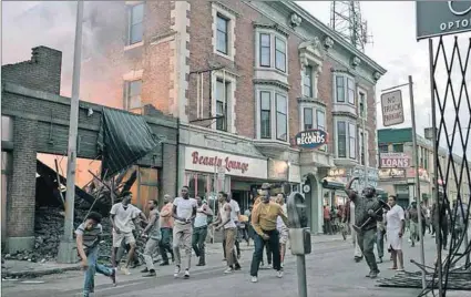  ??  ?? Mayhem and murder: Kathryn Bigelow’s film, with Will Poulter (below) as the vicious cop, controvers­ially depicts the violent events in Detroit in 1967. Photos: Annapurna Pictures & Francois Duhamel