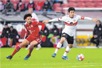  ?? FOTO: ULMER/IMAGO IMAGES ?? Mit Wataru Endo als Gegenspiel­er kann auch ein Leroy Sané (li.) auf dem falschen Fuß erwischt werden.