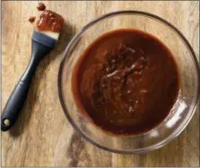  ?? CARL TREMBLAY — AMERICA’S TEST KITCHEN VIA AP ?? Classic barbecue sauce