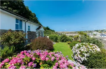  ?? ?? Beach Haven offers sea views and seclusion at popular Polzeath in Cornwall. £1.95m