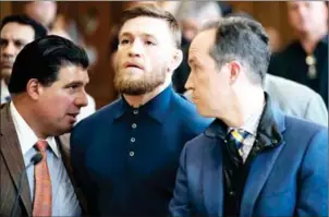  ?? AFP ?? Irish mixed martial arts fighter Conor McGregor looks on at a court appearance in New York on Friday.