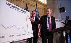  ?? Photograph: Michael Reynolds/EPA ?? The Republican senators John Barrasso, left, and Mike Crapo, right, try to pin inflation on Joe Biden on Capitol Hill in Washington in February.