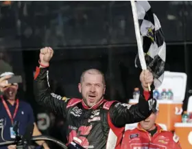  ??  ?? Michael Annett celebrates in Victory Lane after winning the NASCAR Xfinity series auto race at Daytona Internatio­nal Speedway, on Saturday, in Daytona Beach, Fla. AP PHOTO/TERRY RENNA