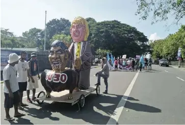  ?? RANIE AZUE/PN ?? The effigy of President Rodrigo Duterte (shown in the picture) being a “rabid puppy” of United States President Donald Trump is the “best way” to describe the policies of the current administra­tion, according to Karapatan-Negros secretary-general...