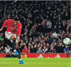 ??  ?? Take that: Manchester United striker Marcus Rashford fires his side ahead at Old Trafford last night