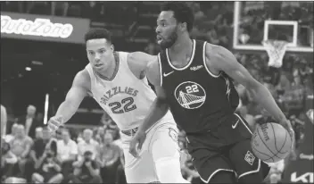  ?? KAREN PULFER FOCHT/AP ?? MEMPHIS GRIZZLIES’ DESMOND BANE (22) guards Golden State Warriors’ Andrew Wiggens (22) in the first half of Game 5 of a second-round playoff series on Wednesday in Memphis, Tenn.