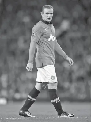  ?? ANDREW YATES / AGENCE FRANCE-PRESSE ?? Wayne Rooney in action during the English Premier League match between Manchester United and Chelsea at Old Trafford in Manchester on Monday. The match ended in a scoreless draw.