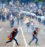  ?? AP ?? Oposición marchó de nuevo en Caracas.