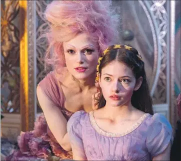  ?? Laurie Sparham ?? SUGAR PLUM FAIRY (Keira Knightley) and Clara (Mackenzie Foy) in “Nutcracker and the Four Realms.”