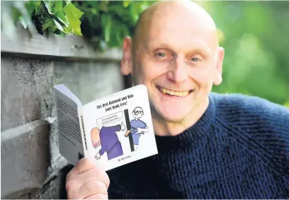  ??  ?? ●●Nick Fisher with his joke book that has been ordered as a wedding gift for Prince Harry